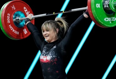 11. MIEJSCE WIKTORII WOŁK W KAT. 64 KG.